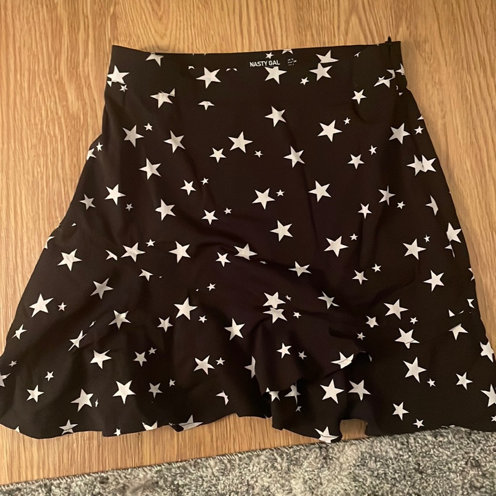 BLACK MINI SKIRT WITH STARS